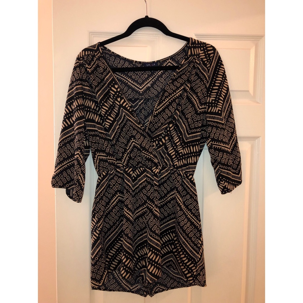 NWOT gold and black romper